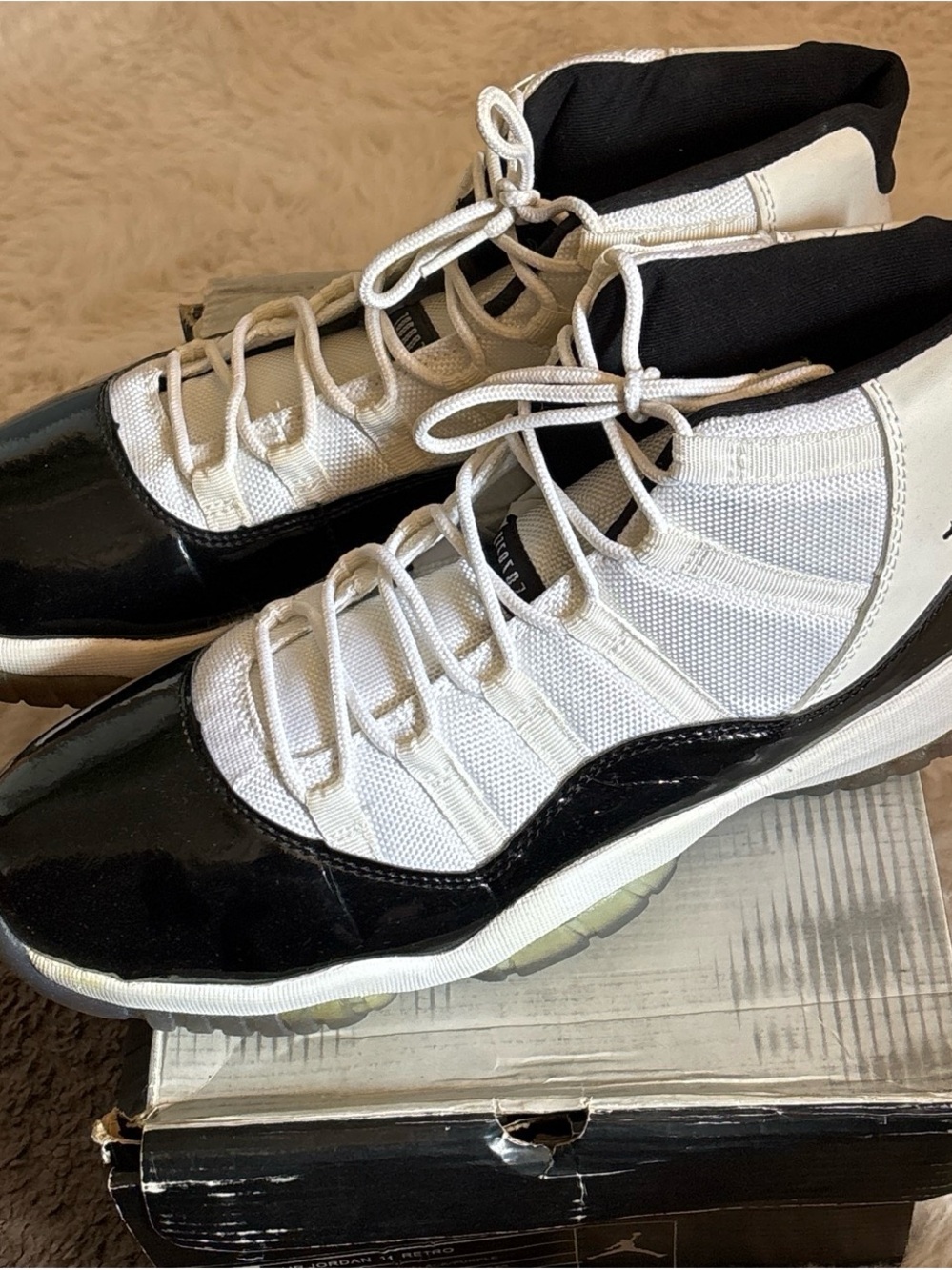 Air Jordan 11 Retro Men’s Sneakers in White and Black